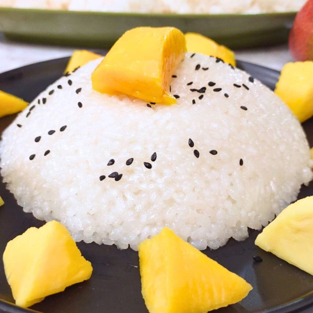 Num Ansom Chek (Sticky Rice with Mango and Coconut)